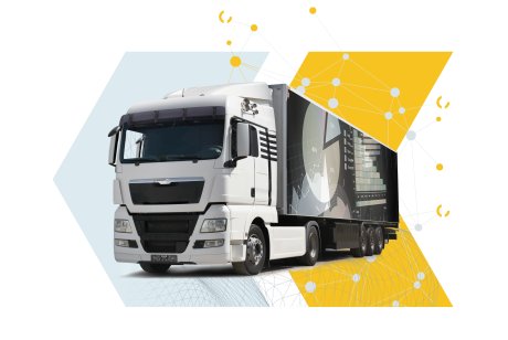 White truck with analytics graphics on a geometric background. White truck with analytics graphics on a geometric background.